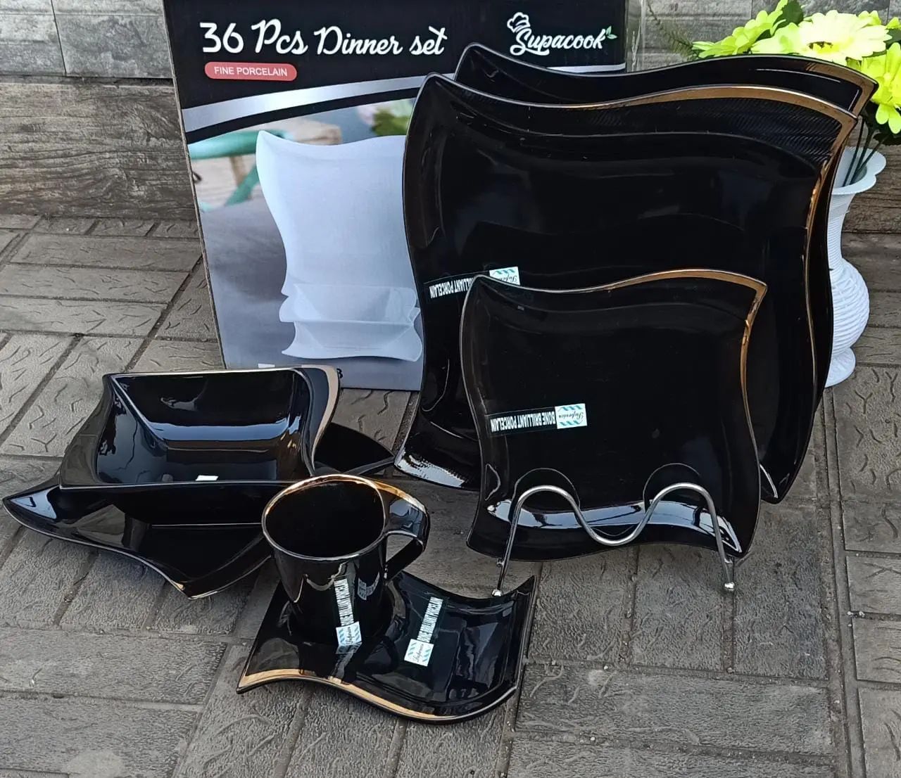36pc black dinner set with gold rim